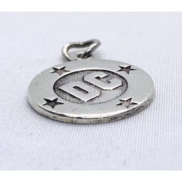 Tiffany & Co Sterling Silver 925 DC Comics Theme Charm Pendant Collectors Piece